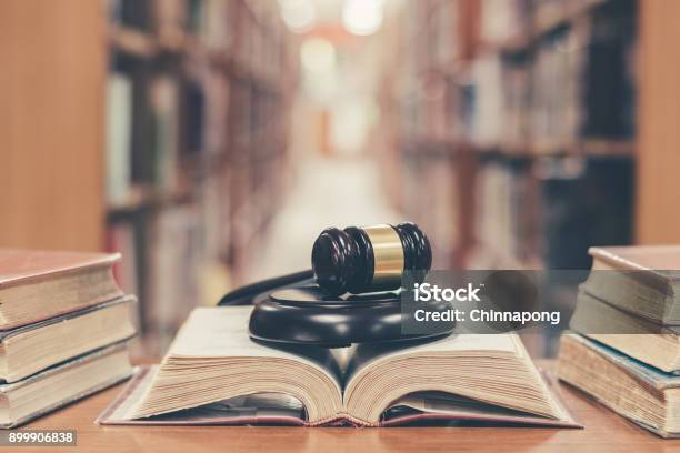 Judge Gavel On Book In Library Stock Photo - Download Image Now - Law, Book, Human Rights