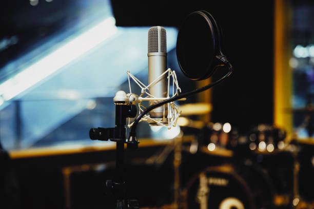 istock Microphone in radio station broadcasting studio,2017 899910410
