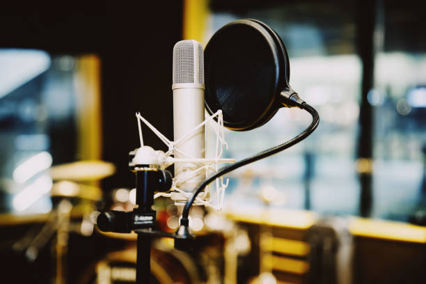 istock Microphone in radio station broadcasting studio,2017 899910412