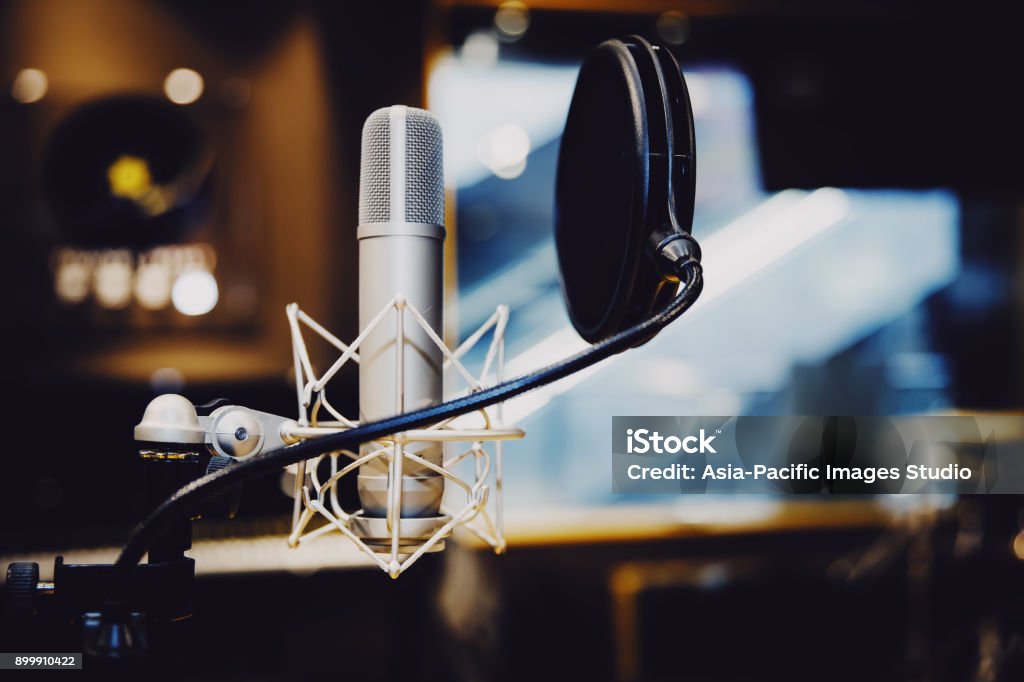 Microphone in radio station broadcasting studio,2017 2017，Studio, Recording Studio, Microphone, Sound Recording Equipment, Radio Station Podcasting Stock Photo