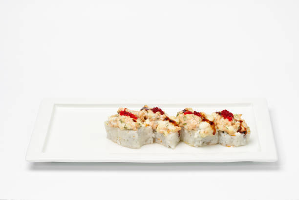 istock Some kind of sushi on white plate. 899910432