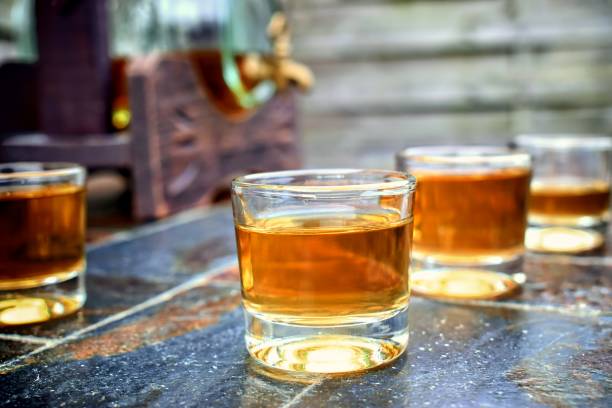 alcohol,taste and drink concept. - cigar whisky bar cognac imagens e fotografias de stock