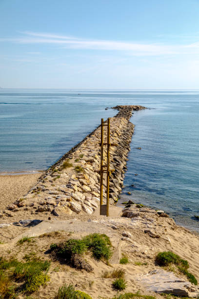 Espigon to the sea in l'Escala Sant Marti of Empuries. Catalonia Spain