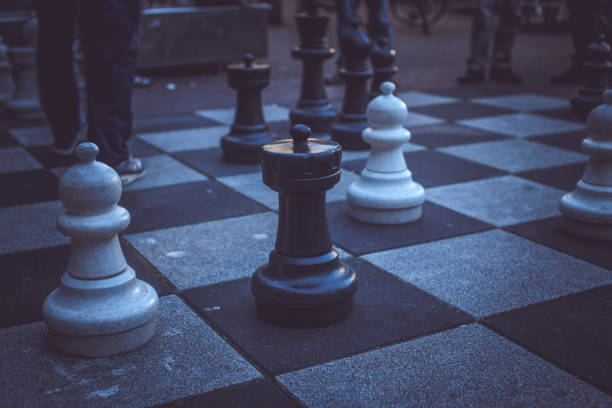 istock Big chess board on the street. 899922510