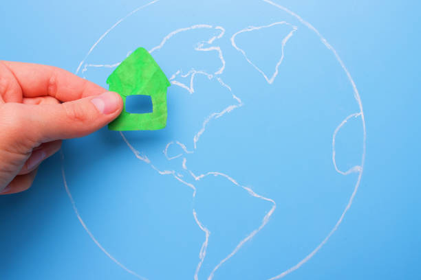 istock green house on the earth 899927790