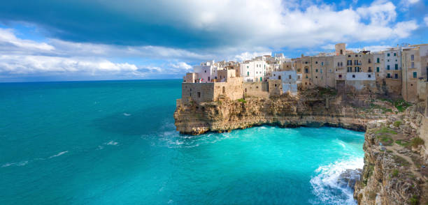 Polignano a Mare (BA, Italy): heaven on earth panorama view Polignano a Mare (BA, Italy): heaven on earth panorama grotto cave photos stock pictures, royalty-free photos & images