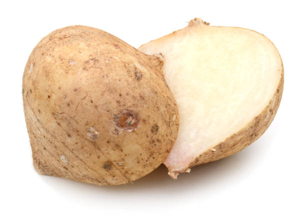 istock one jicama yam cut in half 899946714