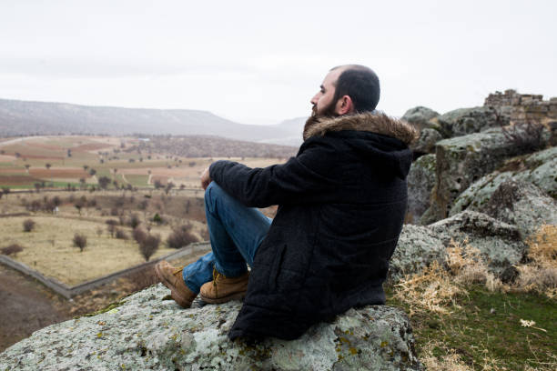 istock a man alone at the top 899950336