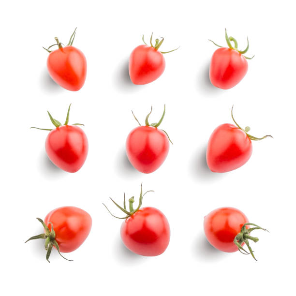 istock Seamless pattern with fresh red tomatoes. Isolated tomato on white background. Cut out collection 899950452