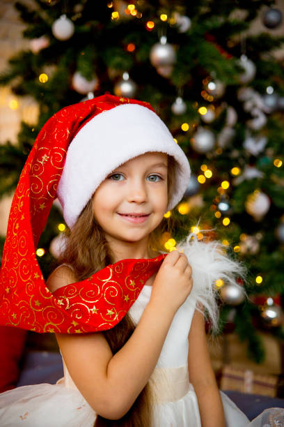 istock Girl celebrating christmas 899951418
