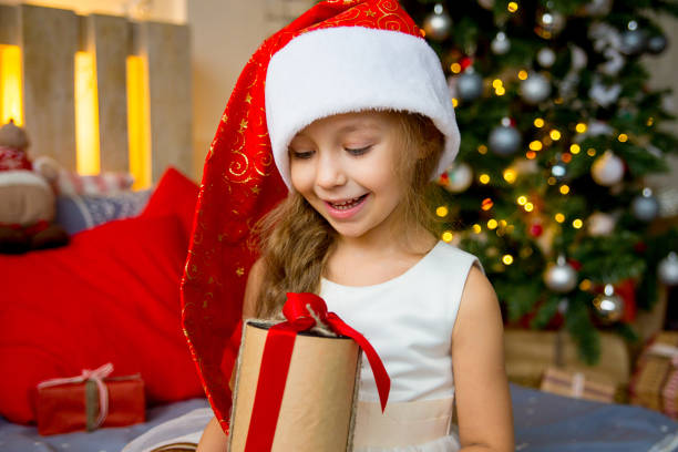 istock Girl celebrating christmas 899951732
