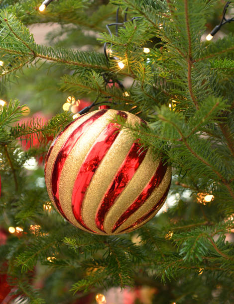 istock Christmas ball on Christmas green tree 899954718