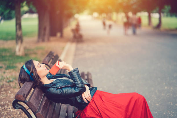 Lonely Girl In The Park Stock Photo - Download Image Now - Music, Sadness,  Leather Jacket - iStock