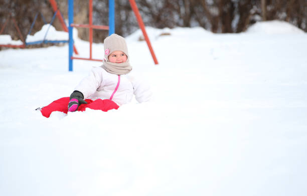 istock children in the snow 899968858