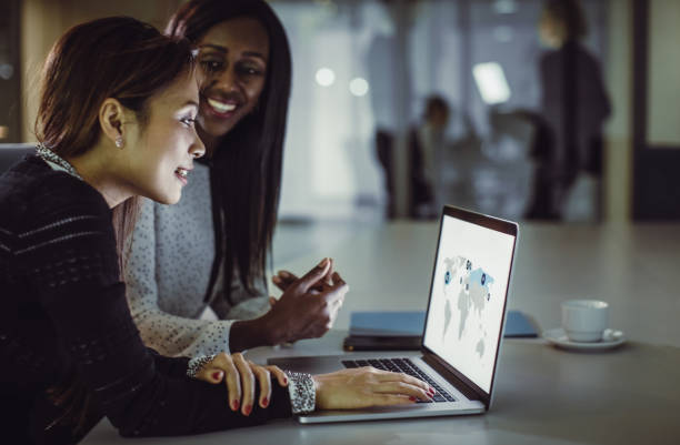 istock Business People Working Late in Office 899971906