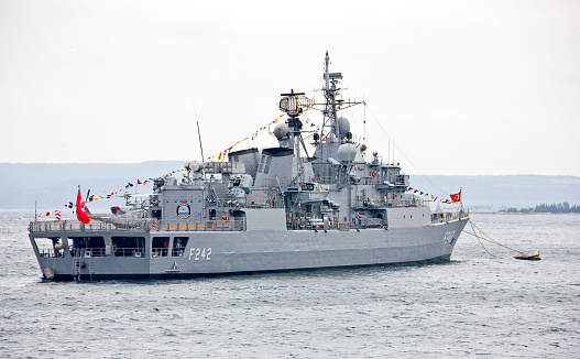 Canakkale, Turkey - May 17, 2017: View of canakkale bosphorus with a warship of the Turkish Navy, which protect the bosphorus.