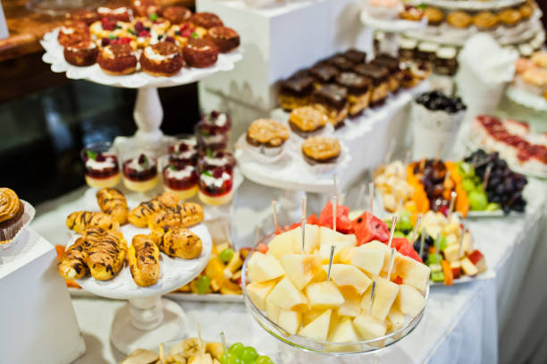 istock Great variety of different multicolored snacks on the wedding buffet. 899983594
