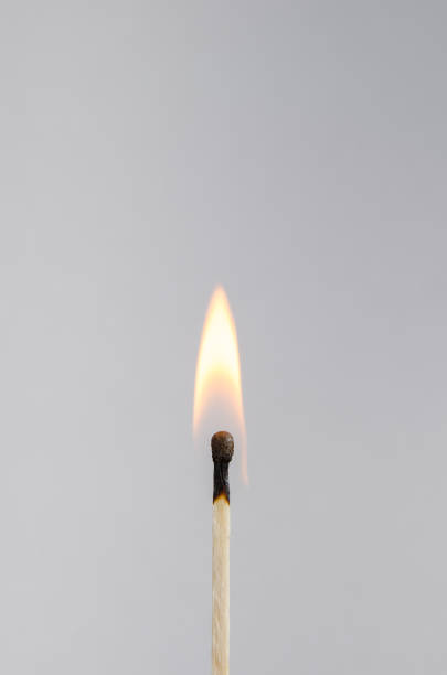 Photo of a burning match on a light background Photo of a burning match on a light background with fire bowie seamount stock pictures, royalty-free photos & images