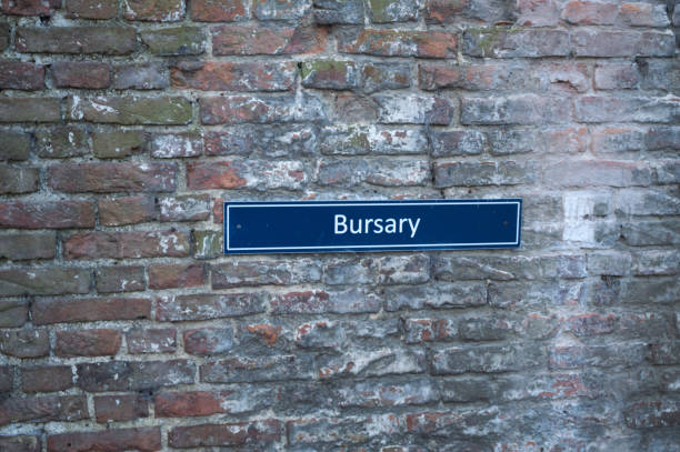 istock Bursary sign in car park 899985340