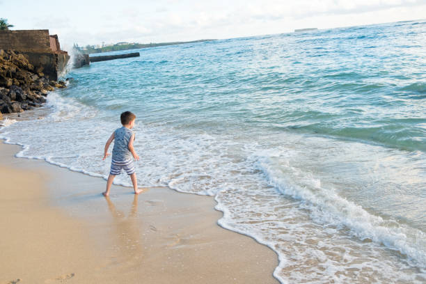 istock Child Playing on Beach in Oahu Hawaii 899994858