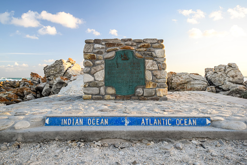 Big marker stone at Cape Agulhas(Cape of the Needles),South Africa,southernmost point of the African continent.It marks the division point between the Atlantic and Pacific Ocean.
