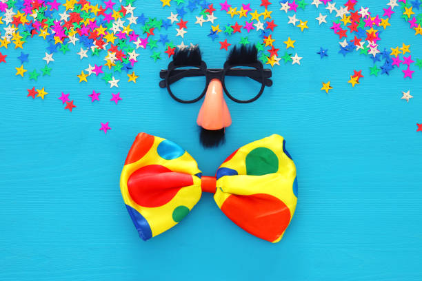 istock Carnival celebration concept with funny mustache glasses. Top view. 899999096