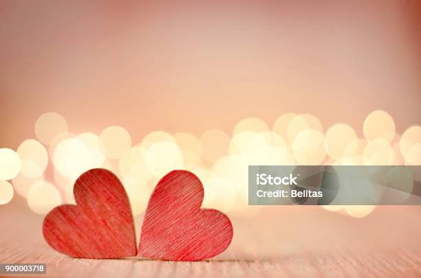 Hearts On A Wooden Table And Background Is A Bokeh Stock Photo - Download Image Now