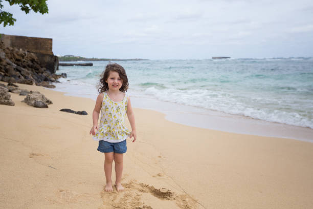 istock Child Playing on Beach in Oahu Hawaii 900004726
