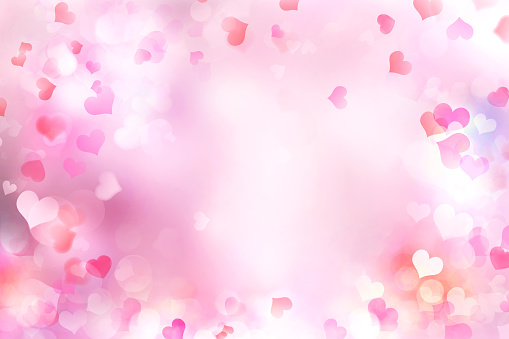 Valentine's day blurred hearts background.Pink romantic backdrop,