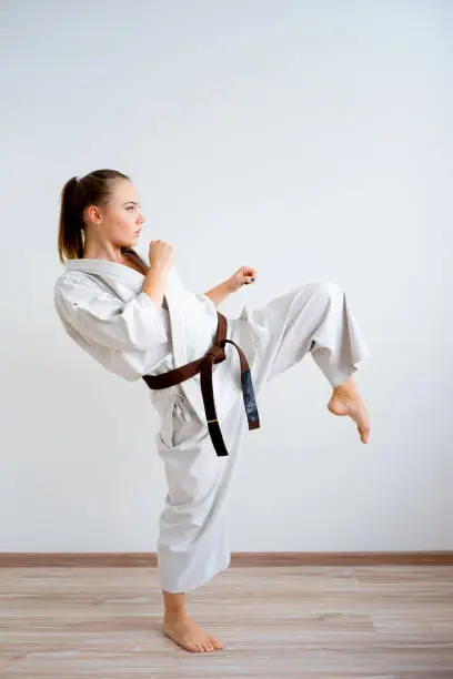 A portrait of a karate girl training