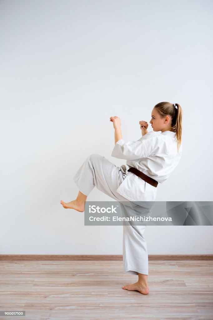 Karate girl training A portrait of a karate girl training Active Lifestyle Stock Photo