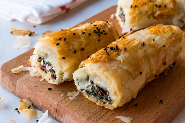 istock Turkish Borek with Spinach and Pastrami or Pastirma. 900028264