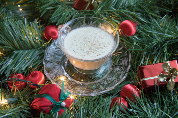 istock Egg nog in garland with lights and ornaments 900043722