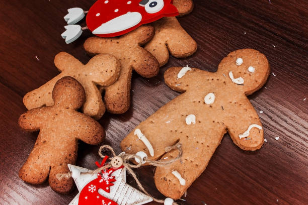 istock Biscuit boy with bright ornaments for Christmas. 900046246