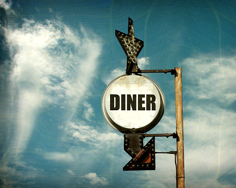 aged and worn diner sign