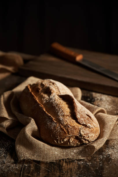 istock Bread loaf with golden textured crust 900048622