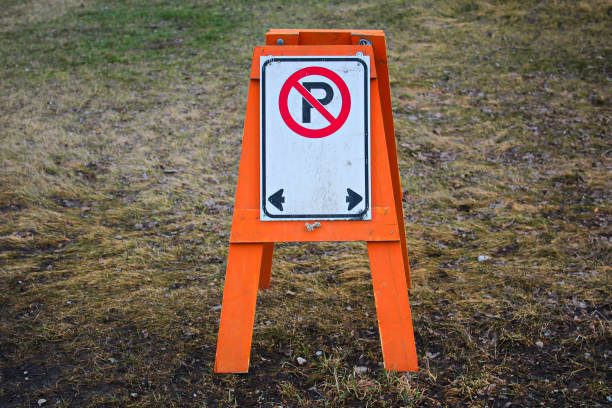 istock A temporary no parking barrier with right and left arrows 900071350
