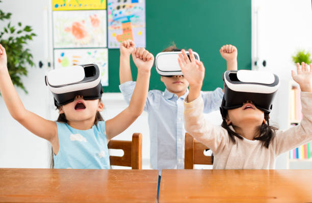 istock children with virtual reality headset in classroom 900075790