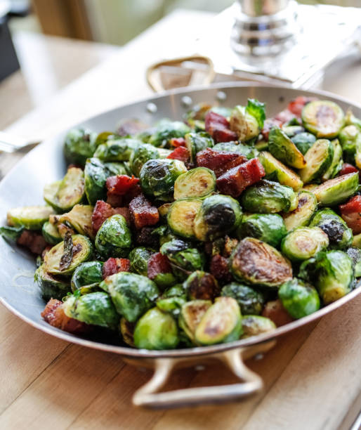istock Roasted Gourmet Brussel Sprouts and Pork Belly 900079848