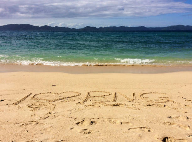 istock Sand writing, Doini Island, Papua New Guinea 900082358