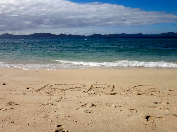 istock Sand writing, Doini Island, Papua New Guinea 900089840