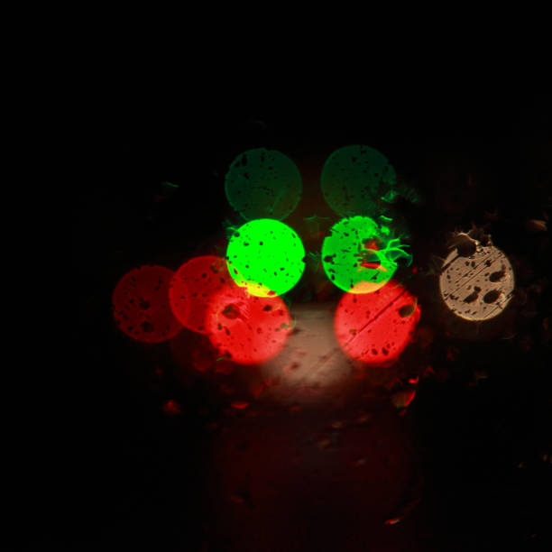 istock A view through glass window against street bokeh lights 900093488