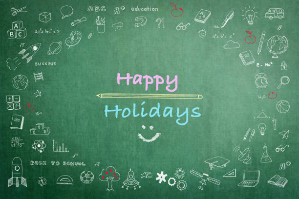 istock Happy holiday greeting on school chalkboard with doodle 900093682