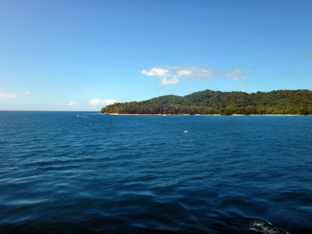 istock Doini Island from a cruise ship, Papua New Guinea. 900093914