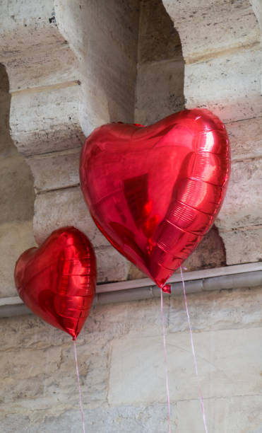 istock Little pink color heart shape balloon 900097566