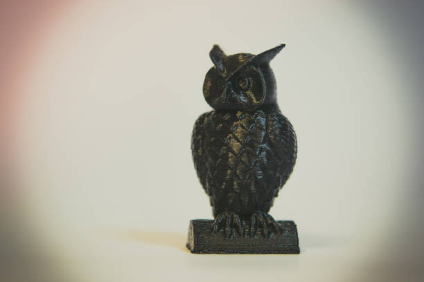 istock Abstract object of black color printed by 3d printer 900111176