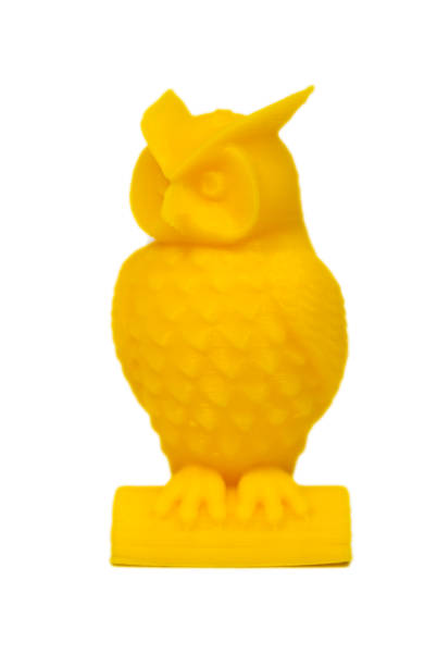 istock Abstract object of yellow color printed by 3d printer isolated on white background. 900111610