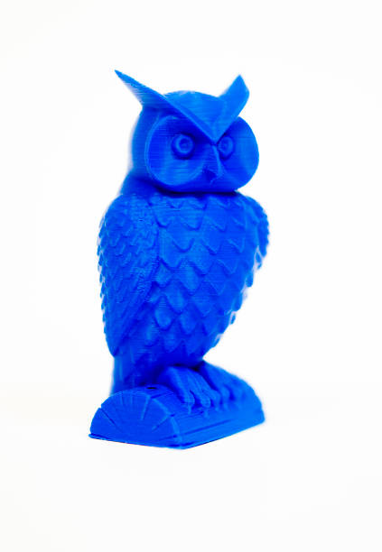 istock Abstract object of blue color printed by 3d printer isolated on white background. 900111842