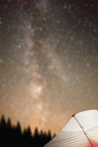 istock Tourist tent glowing under the stellar sky 900114520