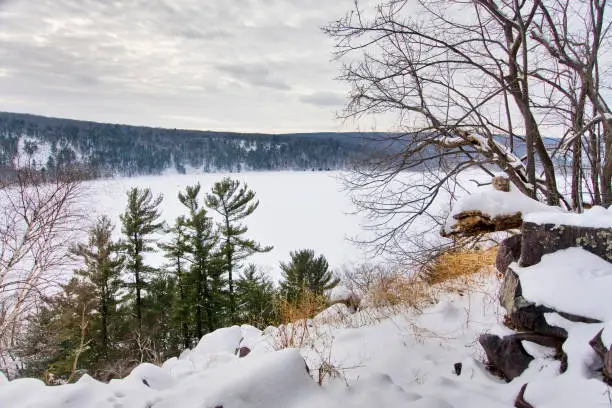 Beautiful winter landscape at Devils Lake State Park, Baraboo area, Wisconsin, USA. View on the lake from rocky south shore Ice age trail. Nature of Wisconsin, Midwest USA.